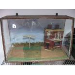 A Victorian Cased Diorama of "The Oak Inn" and Sign Post "Hastings - London", with road to front.