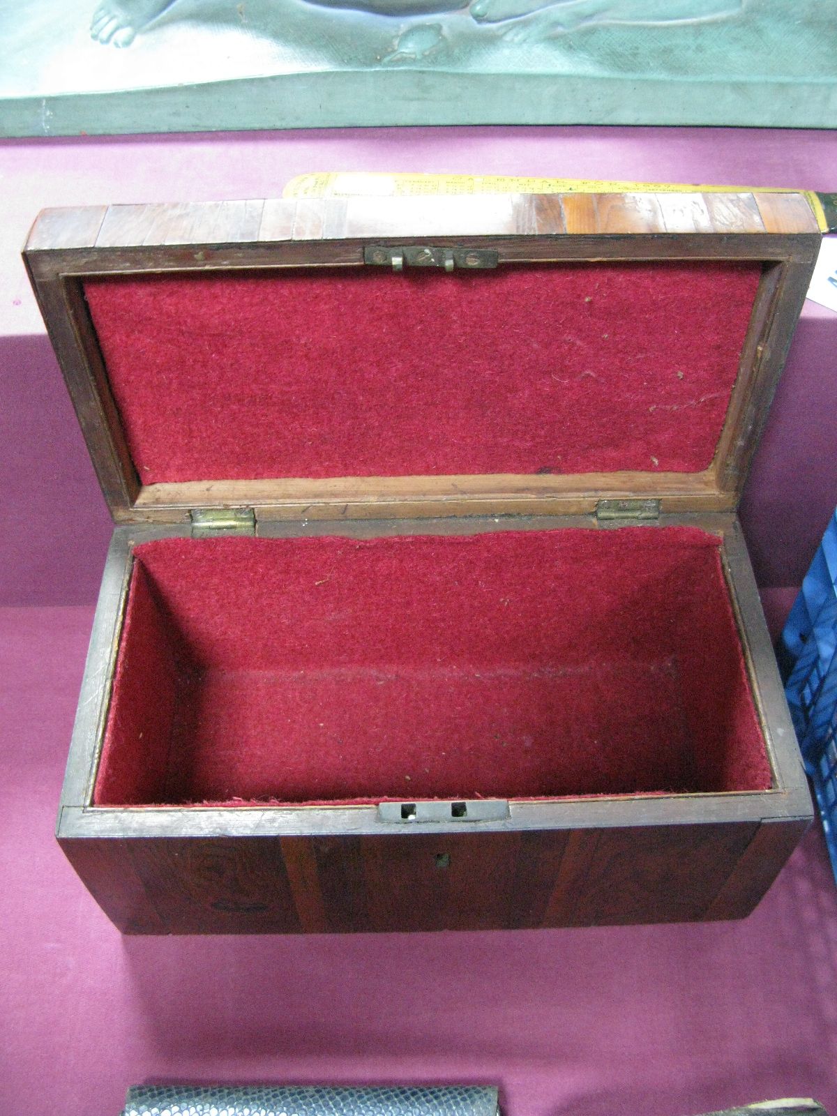 A XIX Century Yew Wood Box, with a hinged lid, baized interior.