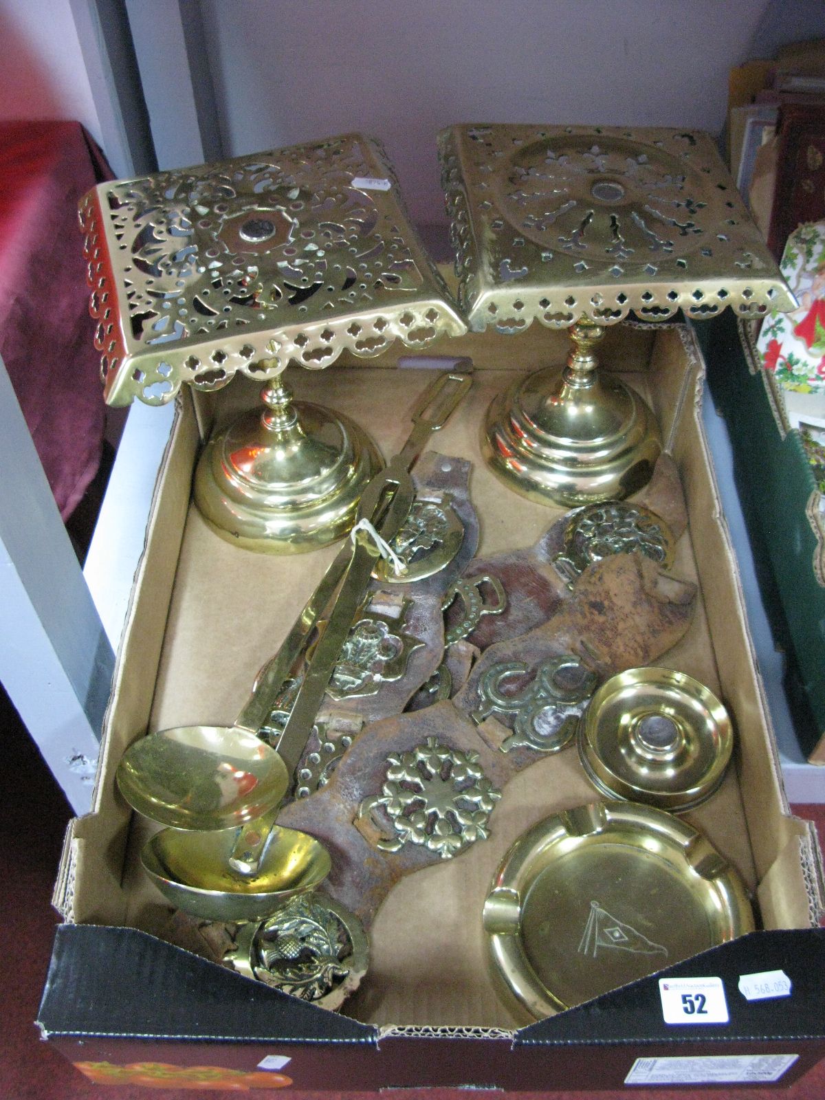 Two XIX Century Brass Trivet Stands, each with pierced top on iron weighted circular base, two