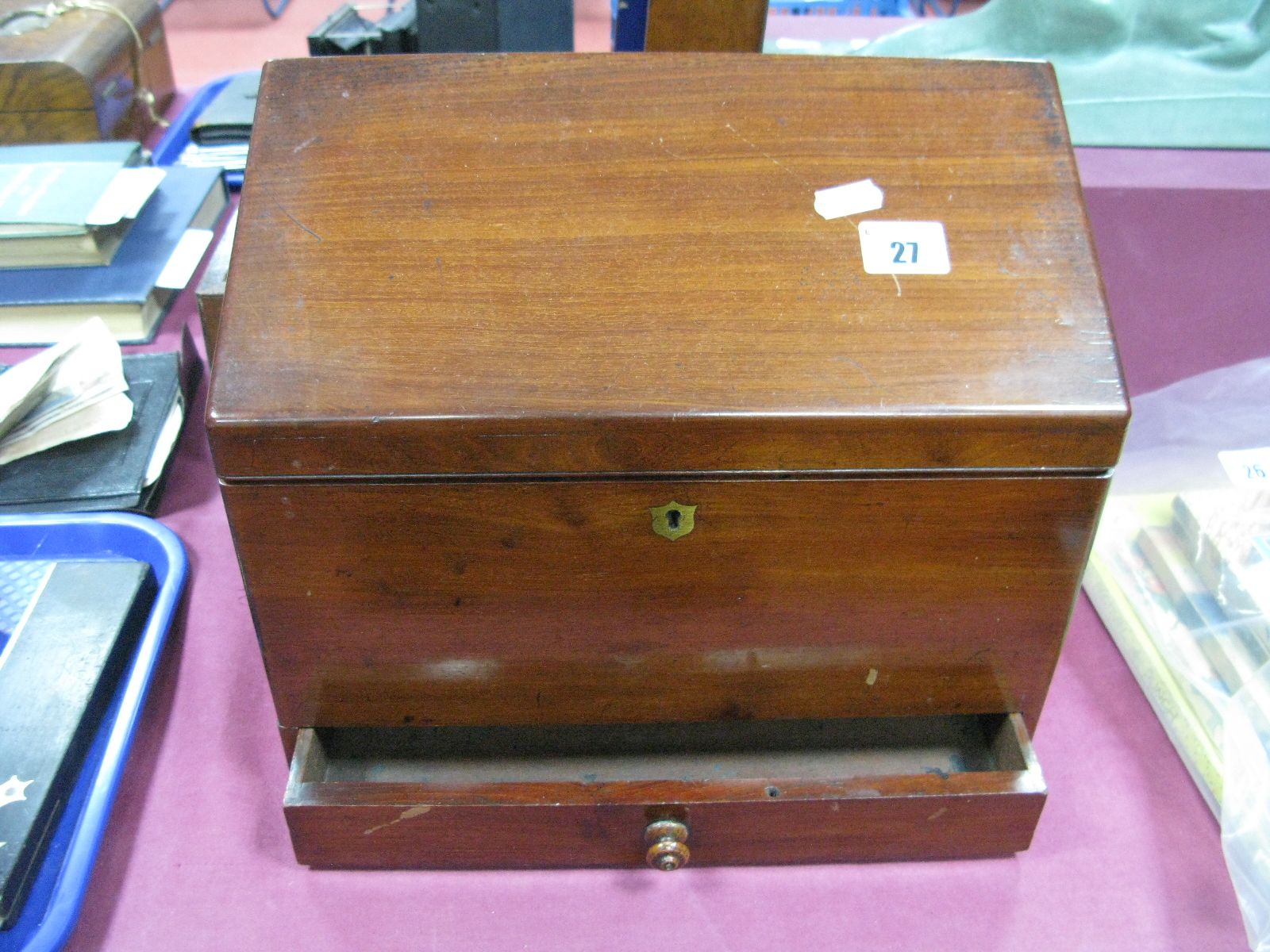 An Early XX Century Mahogany Stationery Box, hinged slope front concealing a six section interior,