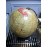 A 1958 Phillips 10" World Globe, on stepped bakelite stand.