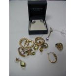 A Collection of Assorted Earrings, including hoops stamped "375" faceted drop earrings etc.