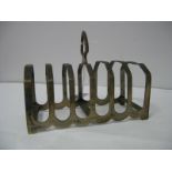 A Hallmarked Silver Seven Bar Toast Rack, with arched central loop handle.