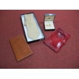 A Red Leather Dunhill Wallet, with press stud fastener, brown leather wallet marked "Highland Calf",