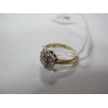 A Modern 9ct Gold Diamond Set Cluster Ring, of flowerhead design claw set, stamped ".50".