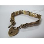 A Gate Link Style Bracelet, to 9ct gold heart shape padlock clasp.