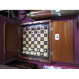 XIX Century Mahogany Travelling Chess Set, with a rosewood and boxwood chess board.