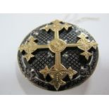 XIX Century Black And White Enamel Disk Brooch, bearing raised gilt symmetrical cross. 4.3cm