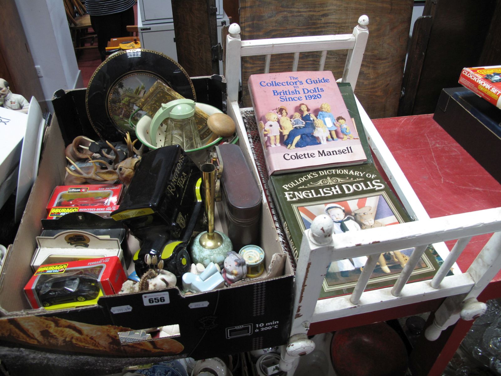 Ringtons Ceramic Money Box, boxed Burago diecast, enamel ware vanity set, dolls wooden cot, books,