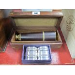 Leather Bound Brass Three Draw Telescope, and four napkin rings.