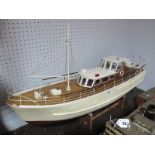 A Wooden Kit Built Radio Controlled Model Motor Boat, fitted with decaperm 6 volt electric motor,