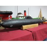 A Remote Control Submarine, of fibreglass construction with sealed inner chamber and servo