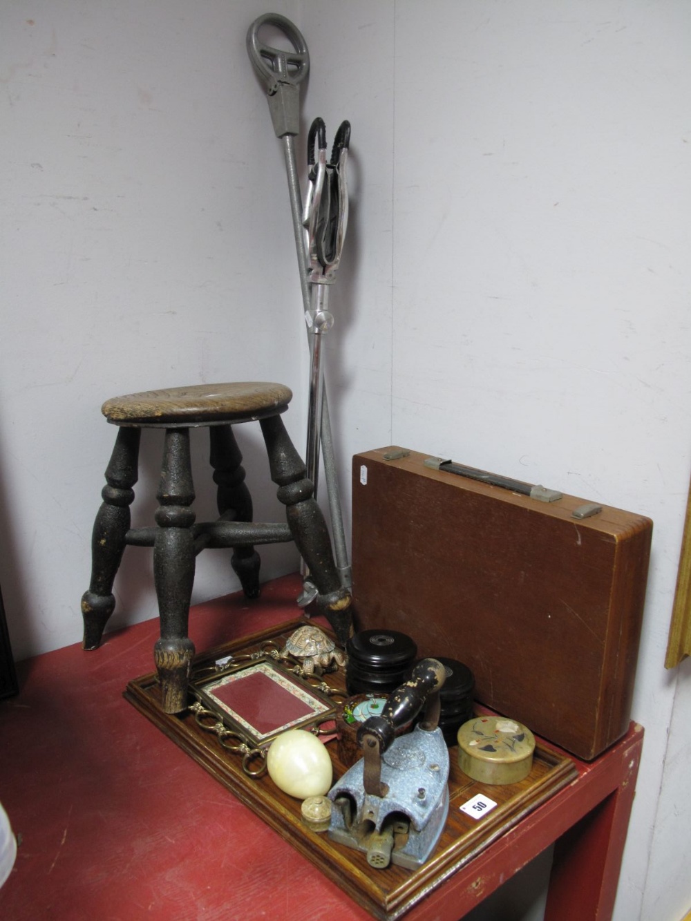 A Victorian Elm Stool, artists box and contents, turned ebonised jars, smoothing iron, onyx egg, two