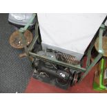 A Singer Sewing Machine, with cast iron 'Bellow' treadle frame, stool with cast iron pedestal,