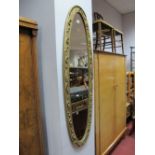 Early XX Century Oval Bevelled Wall Mirror, in tortoiseshell effect frame; another in gilt;
