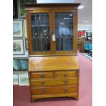 Early XX Century Walnut Bureau Bookcase, having honeycomb lead glazed upper doors over fall front