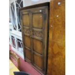 XIX To Mid XX Century Oak Double Wardrobe, in the Jacobean manner, having carved scrollwork to