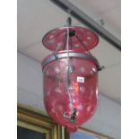 Cranbery Coloured Glass Ceiling Light, of acorn form with iron fittings.