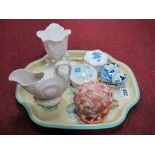 A Shell Shaped Cream Jug, together with trinket boxes, conch shell with carved cameo detail etc.