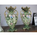 Pair of Early XX Century Continental Pottery Vases, with twin handled and floral decoration on green