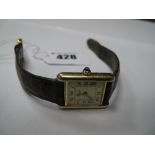 Must De Cartier; A Ladies Tank Wristwatch, the signed rectangular dial with black Roman numerals,