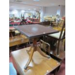 Mahogany Pedestal Table, with a rectangular top, turned pedestal, on swept reeded legs.