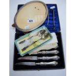 A Cased Set of Fruit/Dessert Knives, oval photograph frame, sugar tongs, etc.