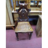 XIX Century Oak Hall Chair, the shaped back with oval centre and serpentine shaped seat on turned