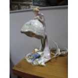A XX Century Continental China Figural Table Lamp, in the Art Nouveau manner, with arched lady