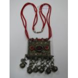 A Bedovin Hirz Prayer Box Necklace, with collet set detail, opening at one end, suspending bells, on