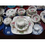 A Wedgwood "Charnwood" Eight Setting China Tea Service, with teapot, milk, sugar and two sandwich