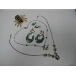 A Modern Shell Inset Necklace, graduated oval collet set, together with similar earrings, a