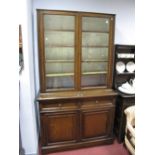 Early XX Century Oak Bookcase, with a glazed top, adjustable shelves, base with two small drawers,