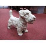 White Painted Cast Iron Door Stop, in the form of a terrier dog, 22.5cms tall.