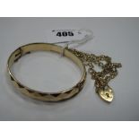 A Curb Link Bracelet, to 9ct gold heart shape padlock clasp; together with a hinged bangle and a
