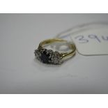 An 18ct Gold Sapphire and Diamond Three Stone Ring, graduated claw set.