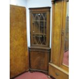 Mahogany Double Corner Cupboard, with a glazed top over a cupboard door, on bracket feet.