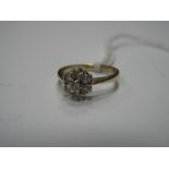 A Modern 9ct Gold Diamond Set Cluster Ring, of flowerhead design, claw set, stamped ".50".