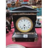 XIX Century Black Slate Mantel Clock, with an arched pediment, circular dial, on a plinth base.