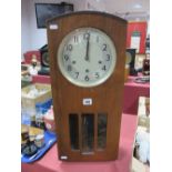 A Mid XX Century Smith's Enfield 31 Day Wall Clock, arched walnut case, silver dial, Arabic