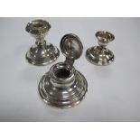 A Hallmarked Silver Inkwell, with reeded detail; together with a hallmarked silver dwarf candlestick