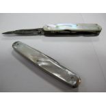 A Multi Purpose Folding Knife, including scissors and button hook, with mother of pearl scales;
