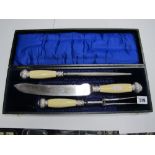 A James Deakin & Sons Three Piece Carving Set, composite handles, cast foliate terminals and