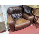 A 'Soficalia International' Stitched Dark Brown Leather Armchair.