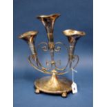 A JC&Co Ltd Plated Three Flute Epergne, of scroll design, on oval base raised on four bun feet,