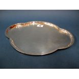 A Hallmarked Silver Dressing Table Tray, WA, Birmingham 1915, of shallow shaped design, 30.8cms