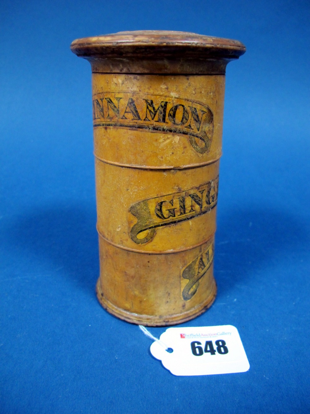 A Victorian Three Tier Circular Section Turned Wood Spice Tower, bearing labels for cinnamon, ginger