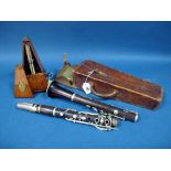 An Early XX Century Hawkes & Son "Senorous Class" Rosewood Clarinet, No. 4164, leather case; A