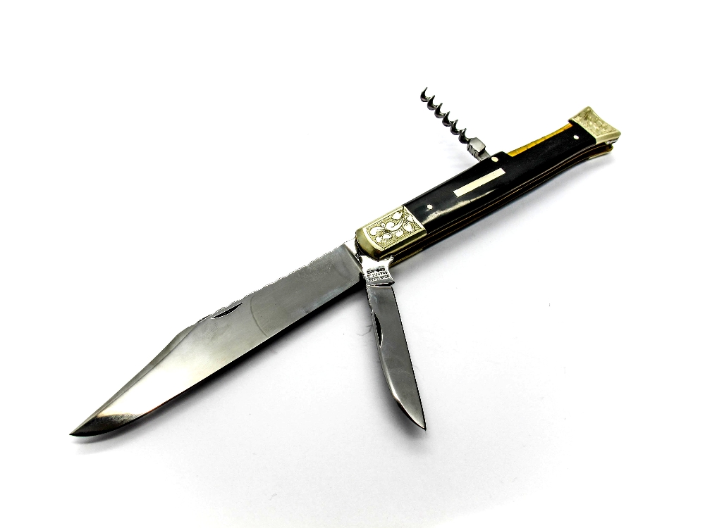 Stan Shaw Sheffield; Fish Tail Folding Pocket Knife, with two blades and a corkscrew, workback to