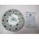 A Chinese Pottery Tek Sing Cargo Dish, of circular form, painted in blue with the Lotus pattern,